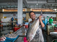 DSC2946  A fisherman shows off his big catch at the central fish market.